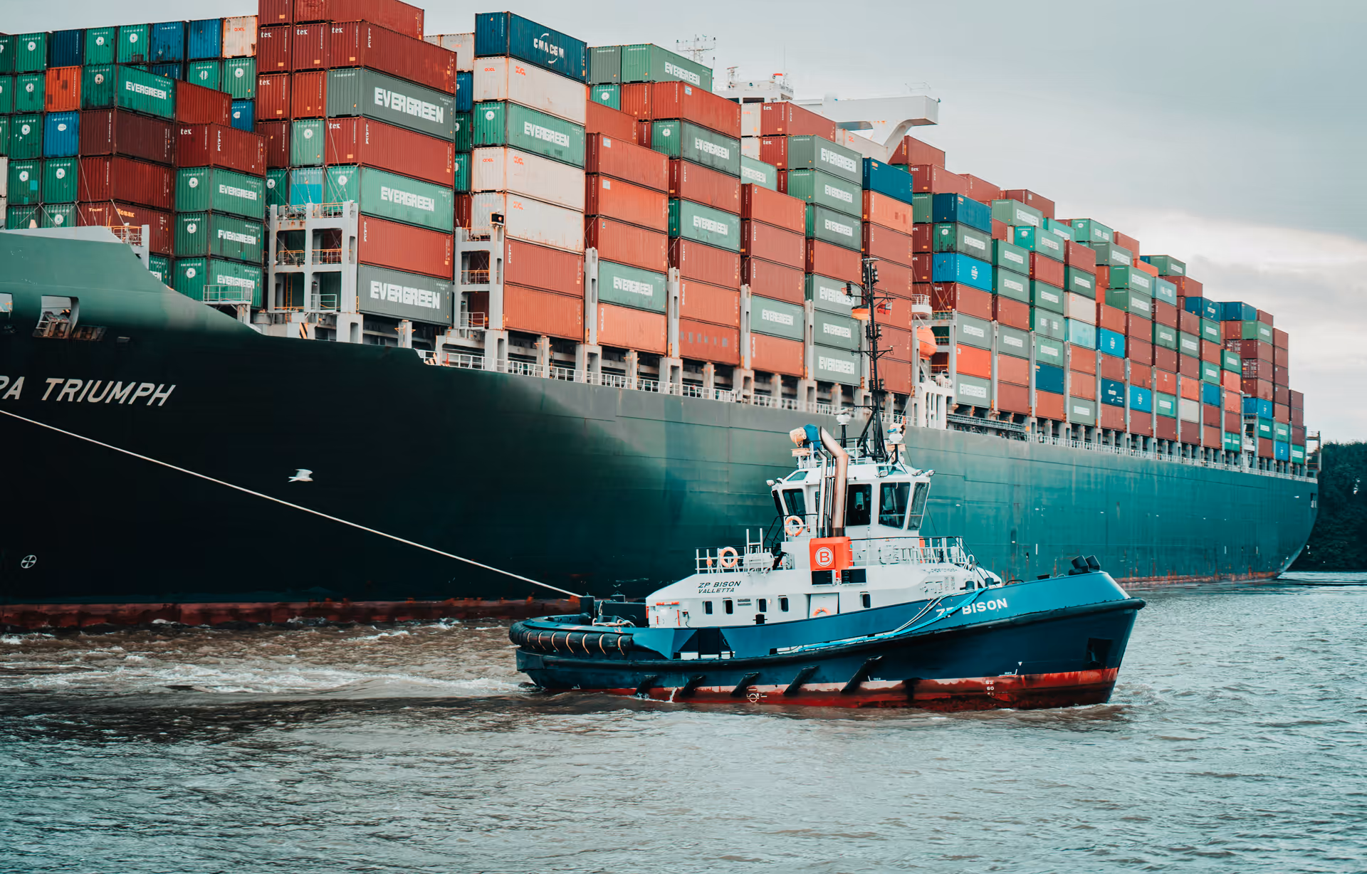 Aerial view of a cargo vessel at sea — marine support by Elhelily Shipping Services